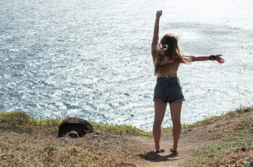 posing on the hawaiian coast