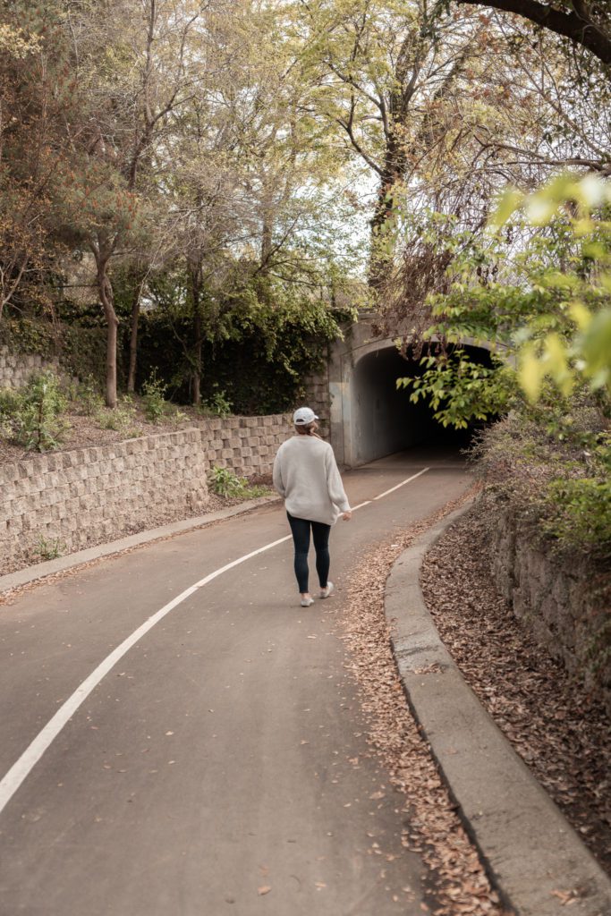 girl walking on the old town trail
